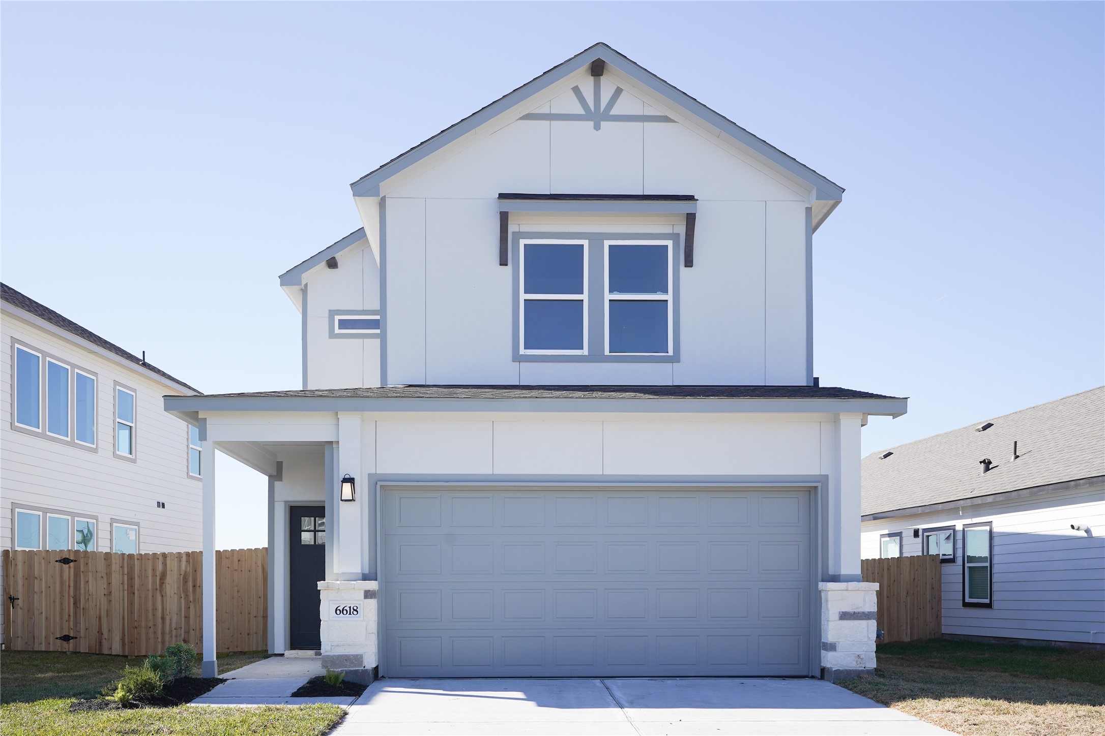 6618 Escondido Drive Rosharon, TX 77583 - Photo 1 of 31 Modern two-story home with a clean facade featuring a double garage, a small front porch, and a fenced backyard. Ideal for families seeking a contemporary design.
