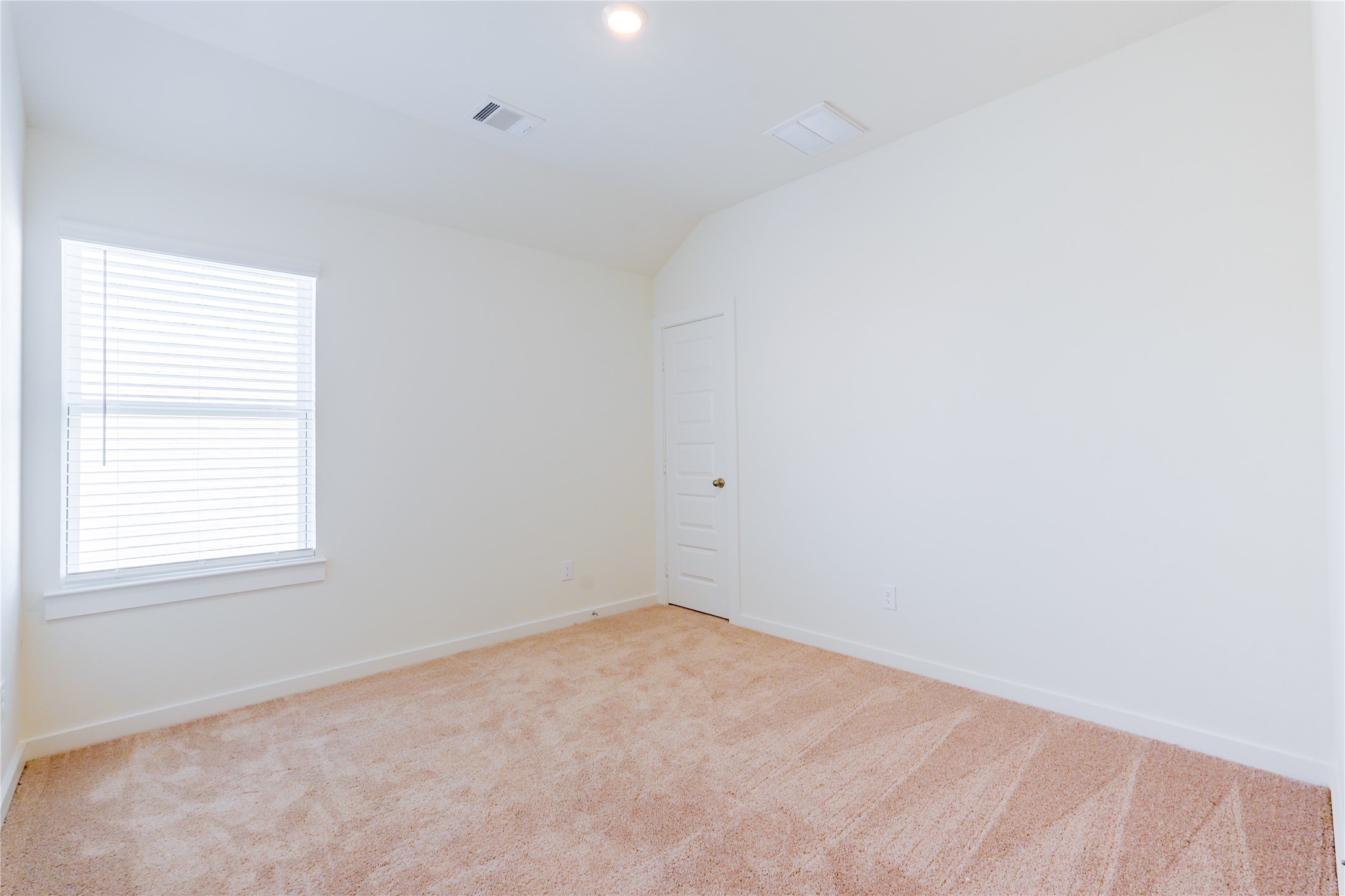 6618 Escondido Drive Rosharon, TX 77583 - Photo 21 of 31 This bathroom features a modern double vanity with sleek fixtures and ample counter space. The neutral tones and tiled shower add a contemporary touch, creating a fresh, inviting space.