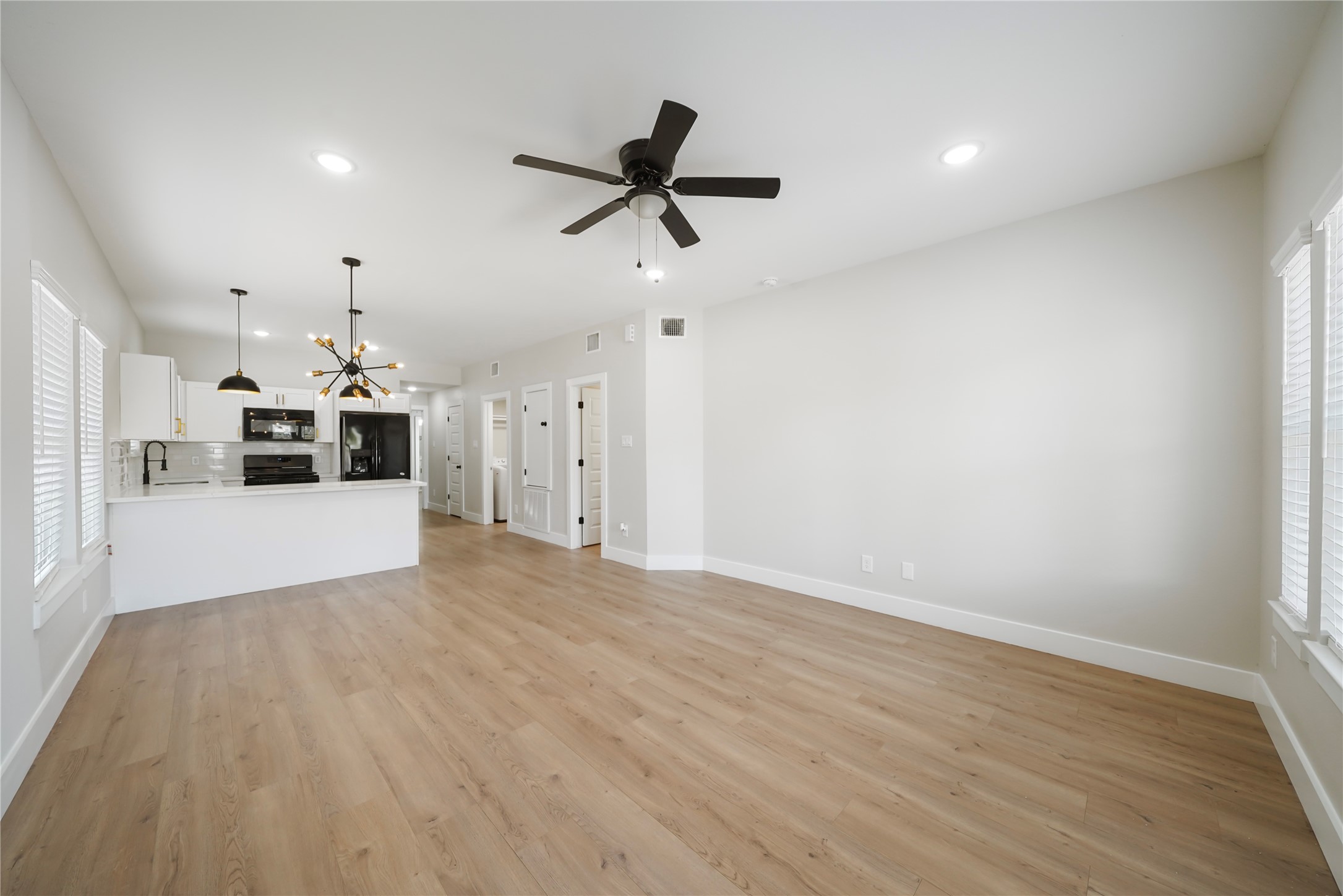 402 East 37th Street, Unit A Houston, TX 77018 - Photo 2 of 10 a view of a kitchen with a sink and a window