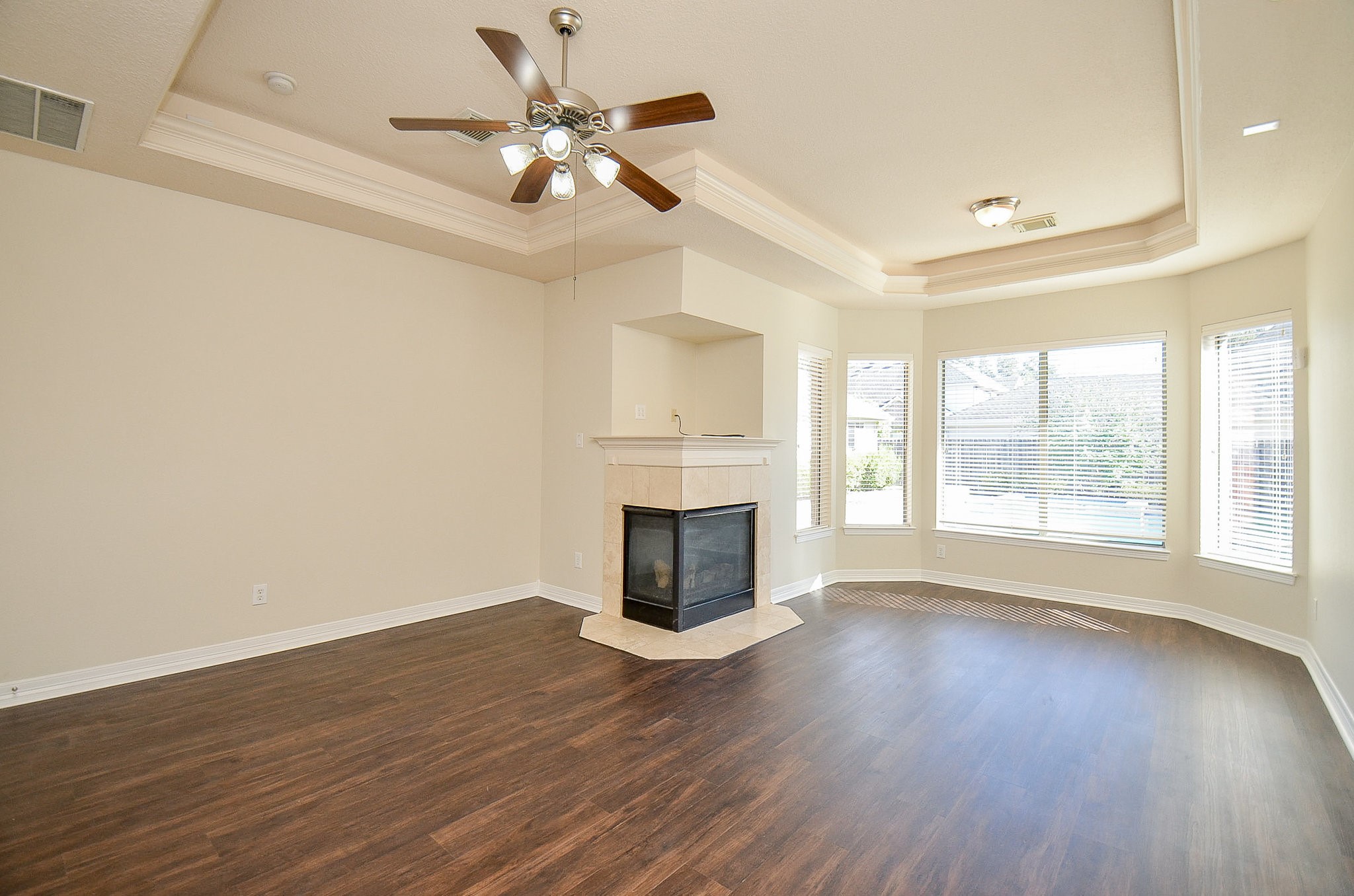 5615 Bent Arbor Lane Katy, TX 77450 - Photo 19 of 42 Can you just imagine lying in bed and seeing the beauty of a glowing fire in the gas log fireplace? Now this is living. Luxury vinyl plank flooring.