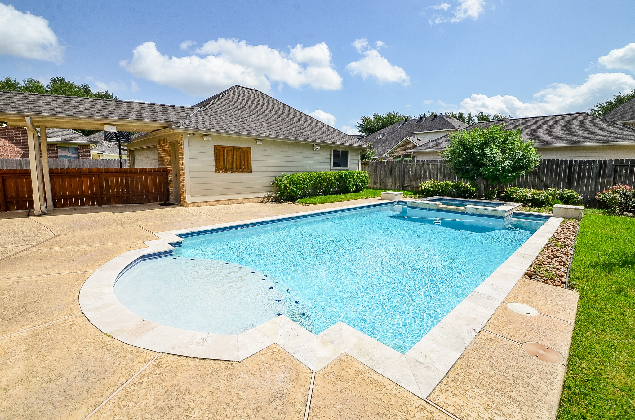 5615 Bent Arbor Lane Katy, TX 77450 - Photo 3 of 42 front view of house with swimming pool and porch