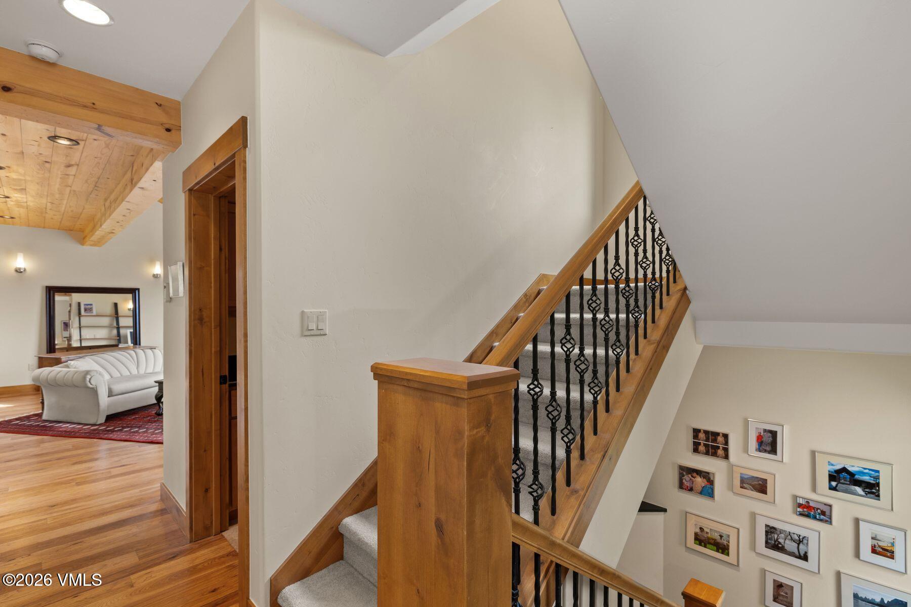 1015 West Wildwood Road, Unit F Avon, CO 81620 - Photo 16 of 35 a view of staircase with wooden floor and stairs