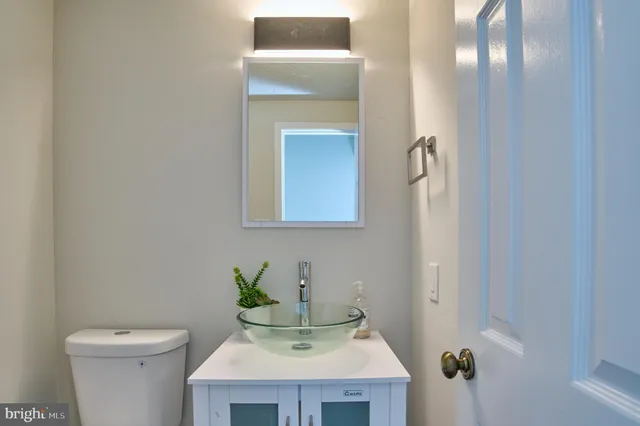 a bathroom with a sink and a toilet