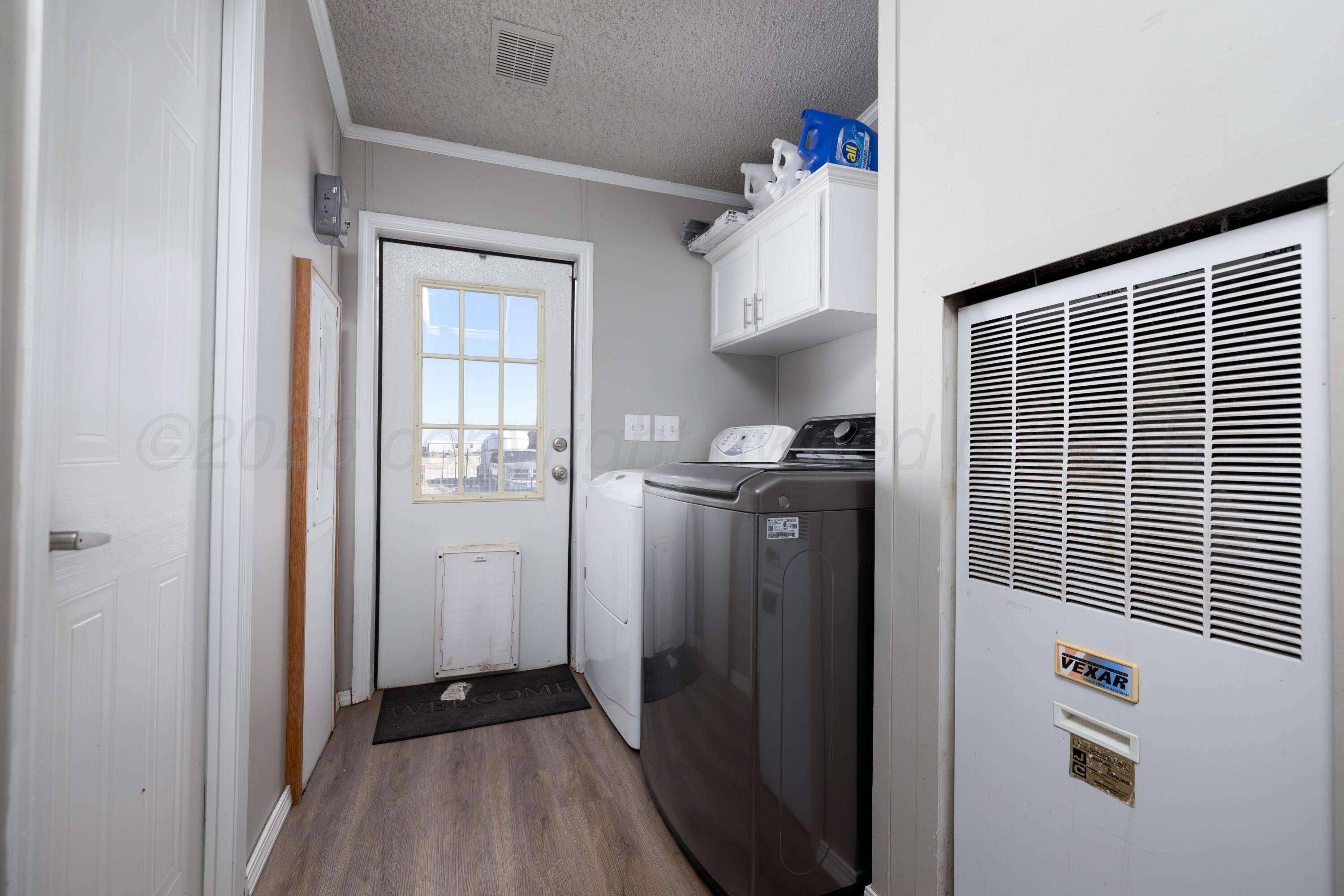 5410 Tranquility Road Amarillo, TX 79118 - Photo 30 of 37 a view of hallway with wooden floor