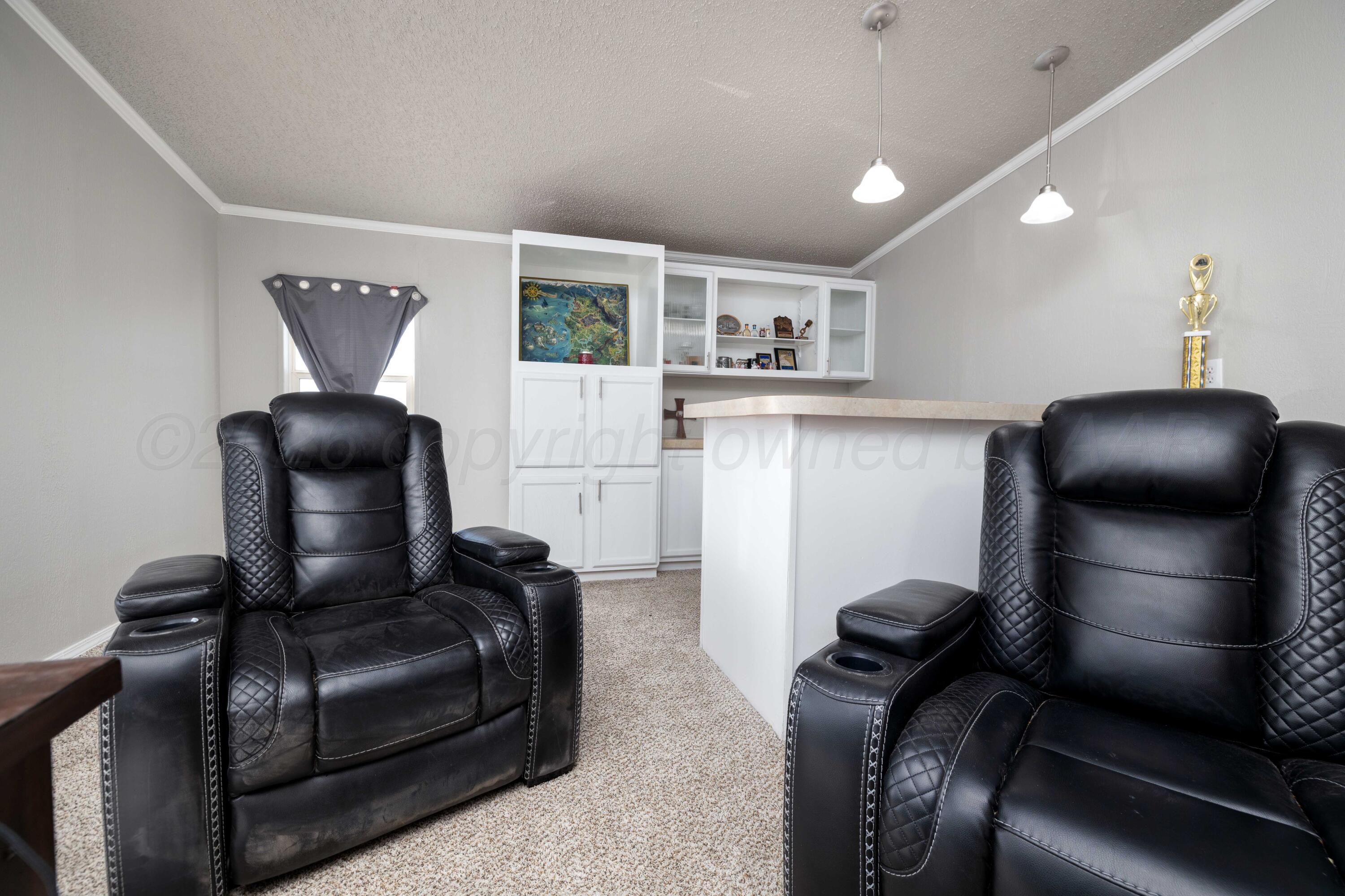 5410 Tranquility Road Amarillo, TX 79118 - Photo 35 of 37 a room with furniture and cabinets