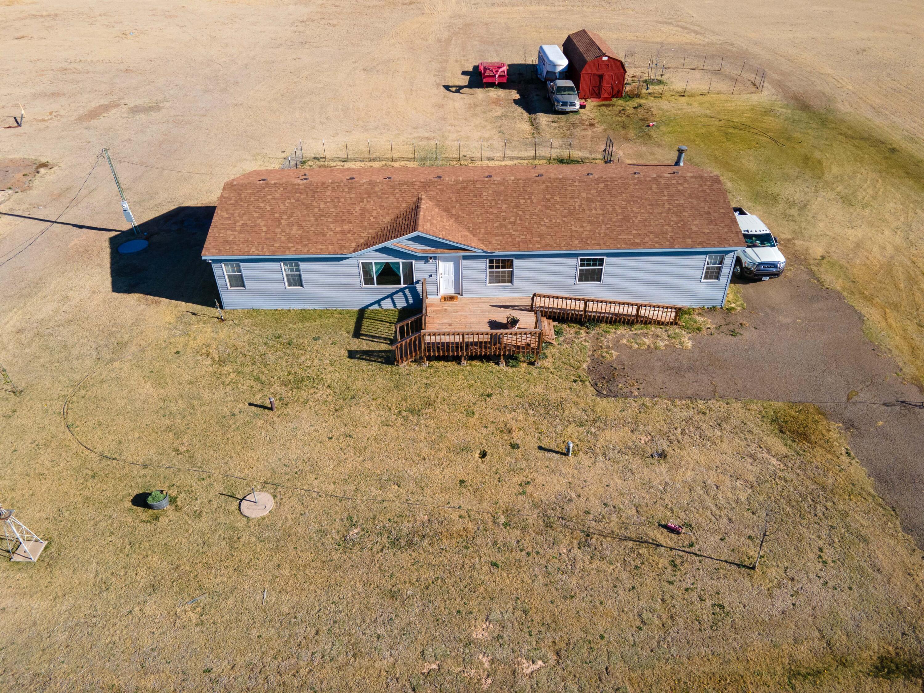 5410 Tranquility Road Amarillo, TX 79118 - Photo 7 of 37 a view of a house with a snow