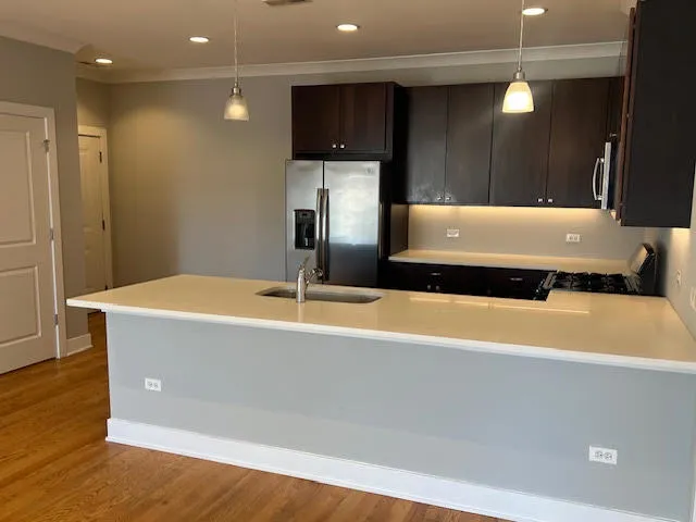 a bathroom with a tub and a sink