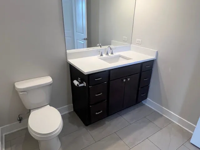 a bathroom with a sink and a toilet