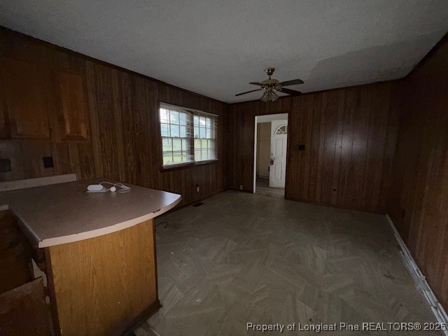 102 Little Street Rockingham, NC 28379 - Photo 19 of 29 a room with a chandelier fan and windows