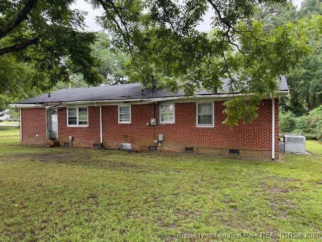 102 Little Street Rockingham, NC 28379 - Photo 25 of 29 a backyard of a house with seating space