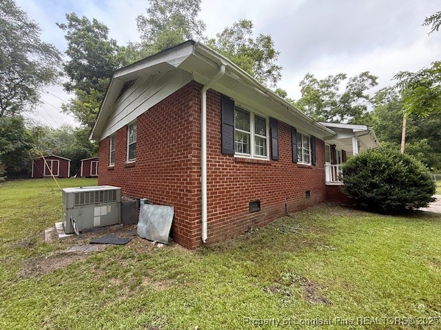 102 Little Street Rockingham, NC 28379 - Photo 28 of 29 a front view of a house with garden