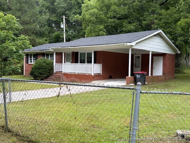 102 Little Street Rockingham, NC 28379 - Photo 5 of 29 a view of house with swimming pool and a yard