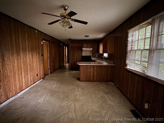 102 Little Street Rockingham, NC 28379 - Photo 10 of 29 a kitchen with stainless steel appliances kitchen island granite countertop cabinets and window