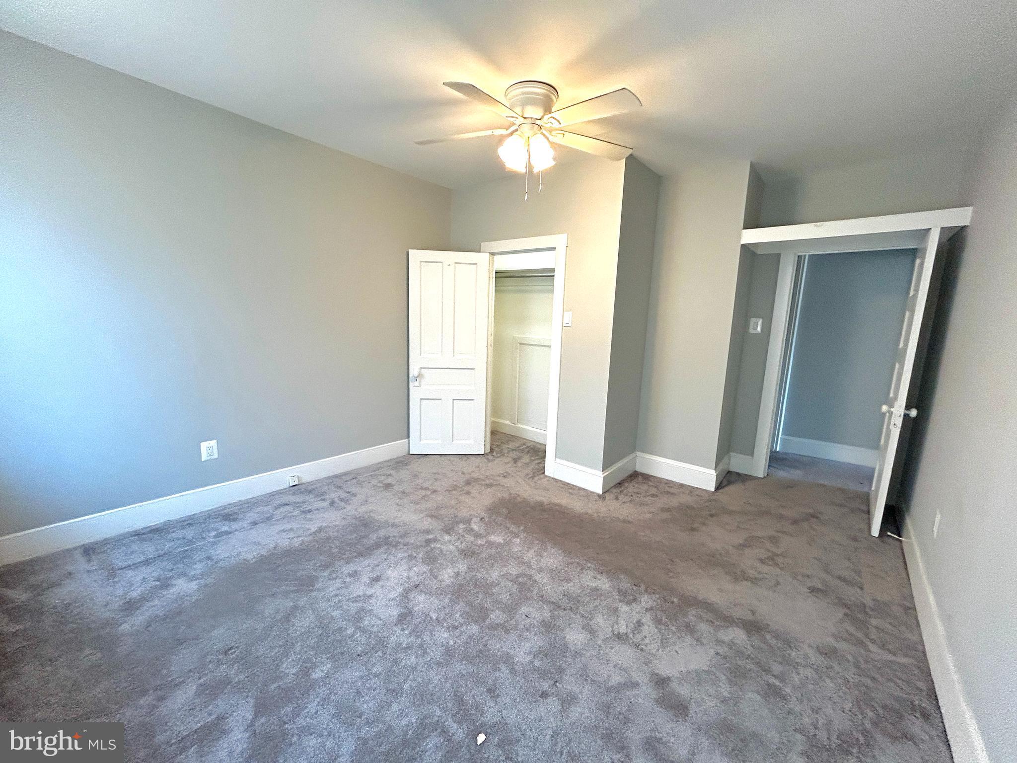 15 Level Road, Unit 5 Collegeville, PA 19426 - Photo 10 of 10 an empty room with closet and a ceiling fan