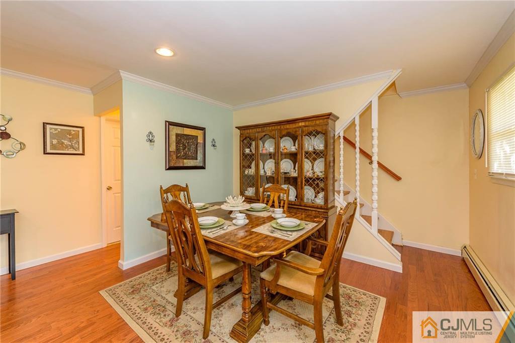 68 Sturgis Road Edison, NJ 08817 - Photo 4 of 25 a view of a livingroom with furniture and wooden floor