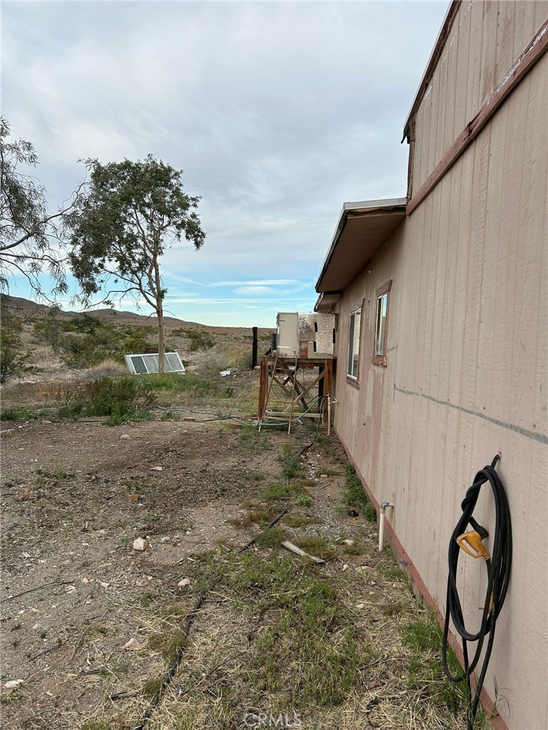 65922167 Unincorporated Parcel Needles, CA 92363 - Photo 12 of 47 a backyard of a house with lots of green space