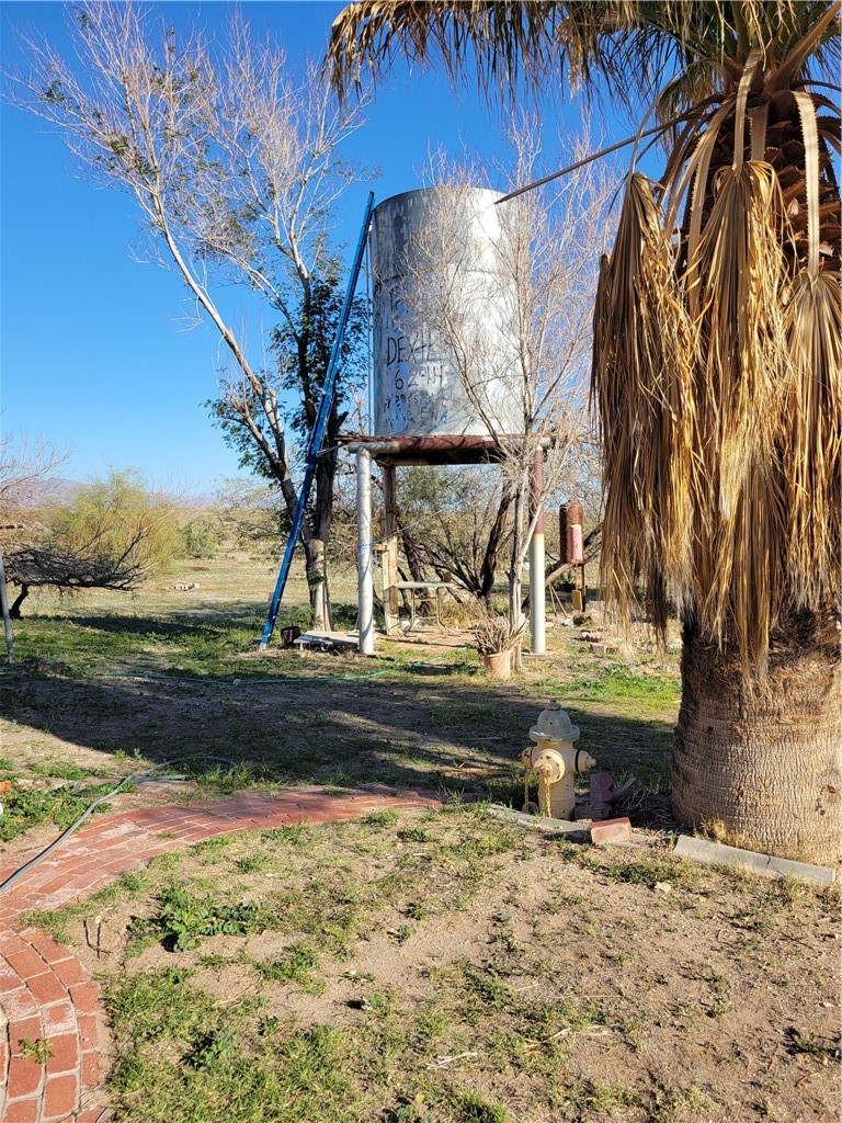 65922167 Unincorporated Parcel Needles, CA 92363 - Photo 14 of 47 a view of a backyard of the house