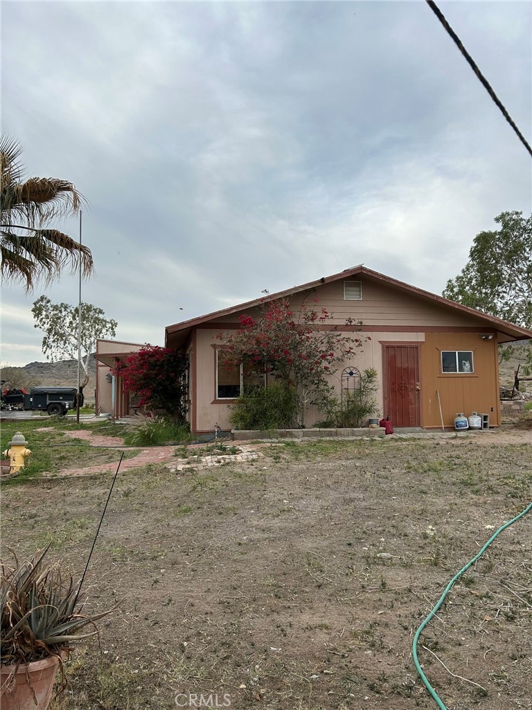 65922167 Unincorporated Parcel Needles, CA 92363 - Photo 17 of 47 a house with trees in front of it