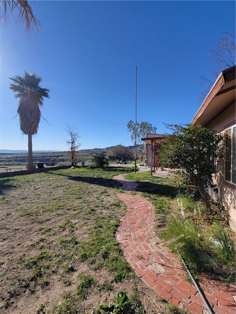 65922167 Unincorporated Parcel Needles, CA 92363 - Photo 18 of 47 a view of a lake with a house