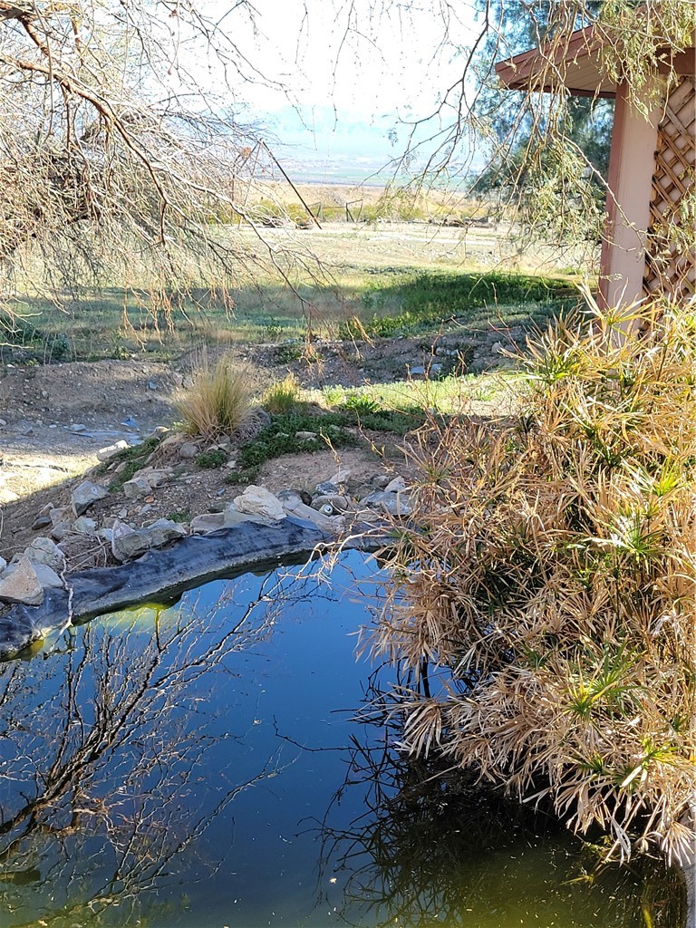 65922167 Unincorporated Parcel Needles, CA 92363 - Photo 21 of 47 a view of lake from a yard