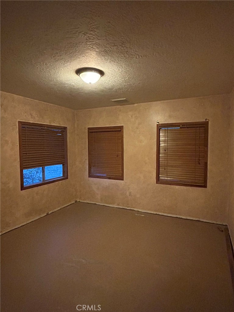 65922167 Unincorporated Parcel Needles, CA 92363 - Photo 37 of 47 an empty room with windows