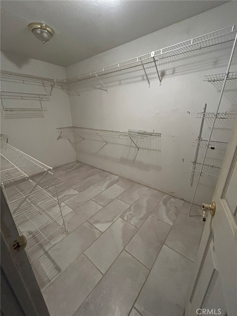 65922167 Unincorporated Parcel Needles, CA 92363 - Photo 39 of 47 a view of a room with racks on the wall