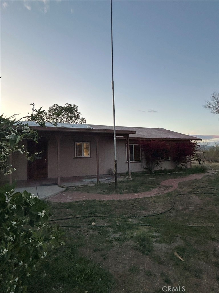 65922167 Unincorporated Parcel Needles, CA 92363 - Photo 6 of 47 a view of a house with a back yard