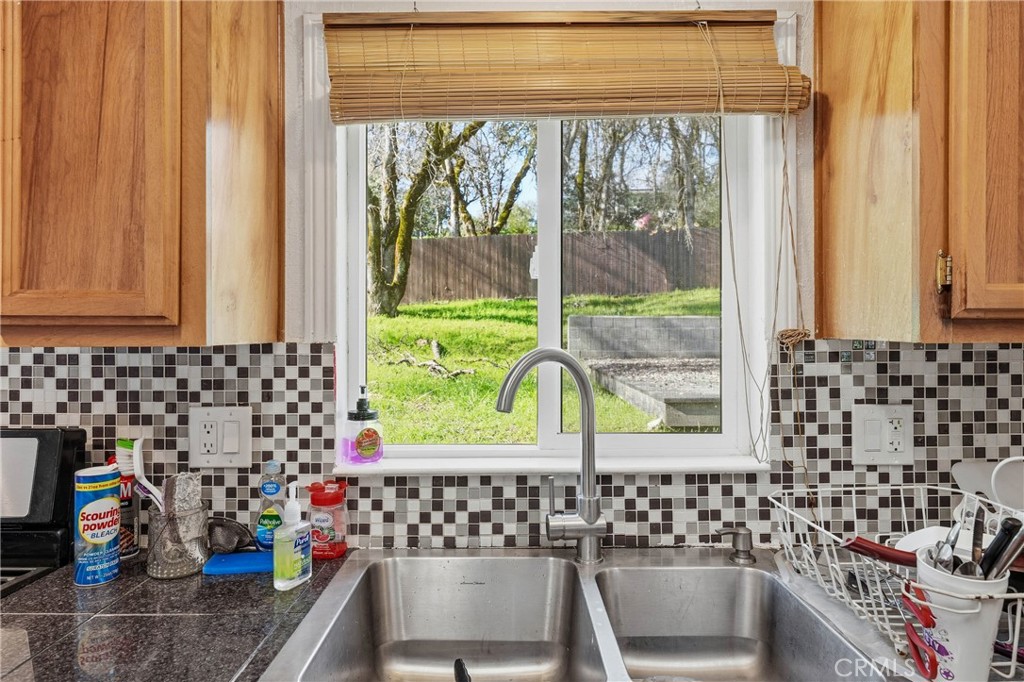 1335 Mountview Road Lakeport, CA 95453 - Photo 23 of 71 a bathroom with a sink a bathtub and next to a window