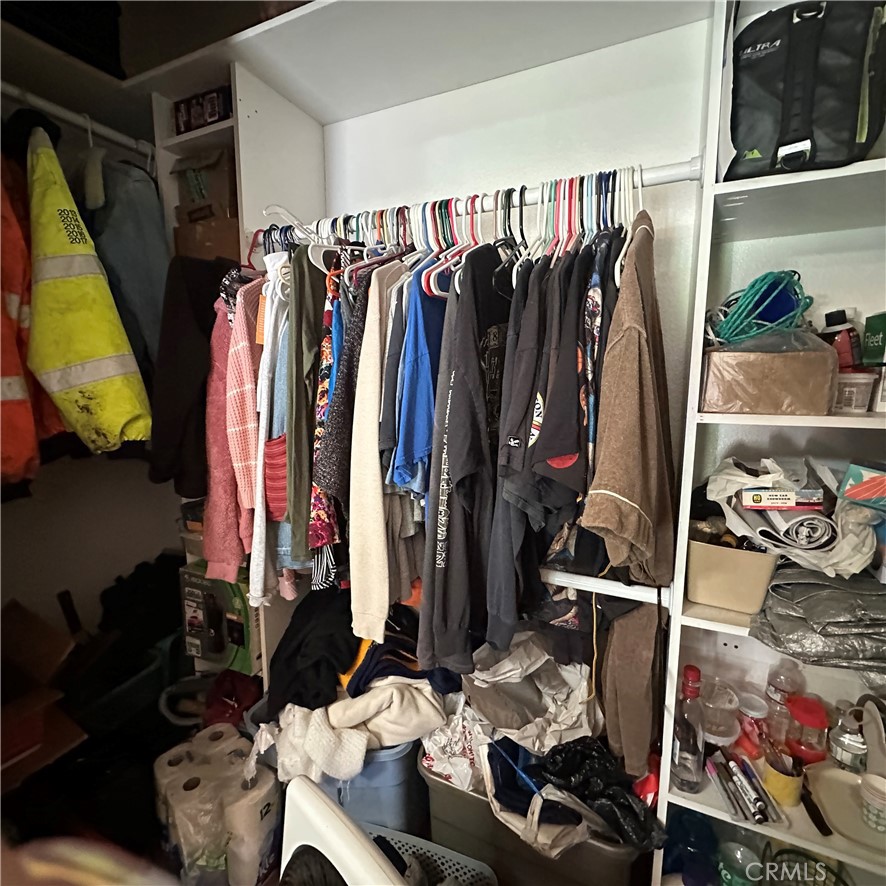 1335 Mountview Road Lakeport, CA 95453 - Photo 24 of 54 a view of walk in closet with clothes and shoes