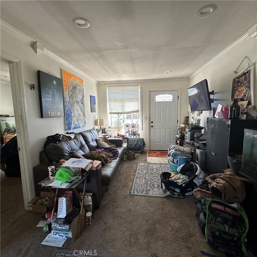 1335 Mountview Road Lakeport, CA 95453 - Photo 30 of 54 a living room with furniture a wooden floor and a flat screen tv