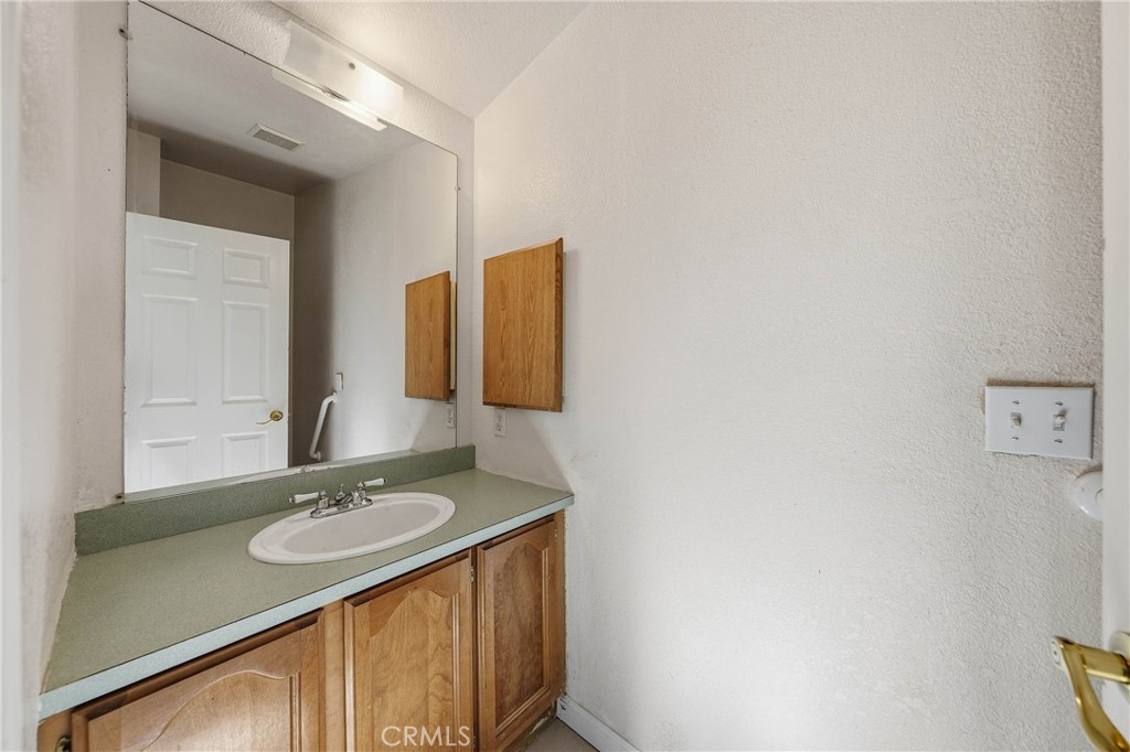 1335 Mountview Road Lakeport, CA 95453 - Photo 35 of 71 a bathroom with a sink and a mirror