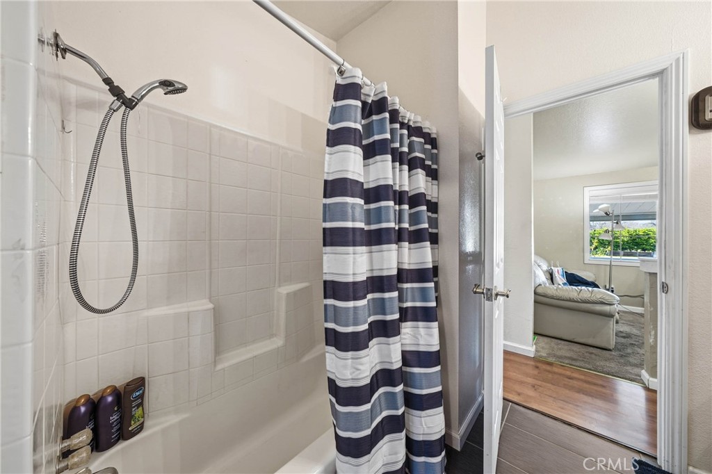 1335 Mountview Road Lakeport, CA 95453 - Photo 39 of 71 a bathroom with a bathtub and a shower