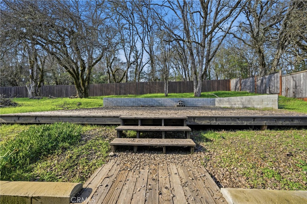 1335 Mountview Road Lakeport, CA 95453 - Photo 44 of 71 a view of yard with wooden deck and trees