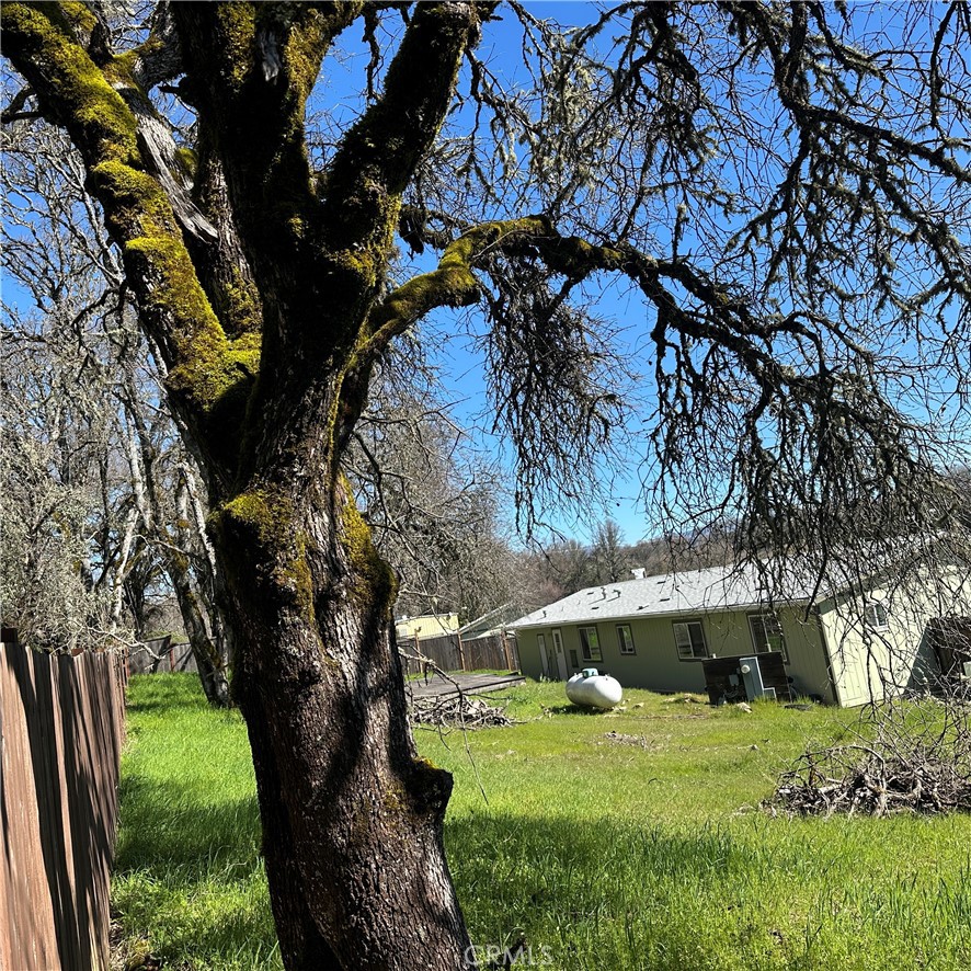 1335 Mountview Road Lakeport, CA 95453 - Photo 46 of 54 a backyard of a house with a garden and outdoor seating