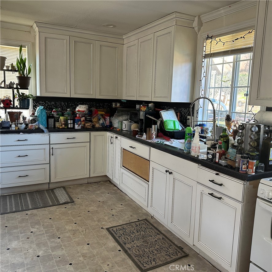 1335 Mountview Road Lakeport, CA 95453 - Photo 51 of 71 a kitchen with stainless steel appliances granite countertop a sink and cabinets