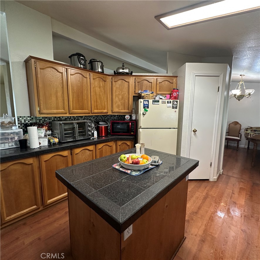 1335 Mountview Road Lakeport, CA 95453 - Photo 10 of 54 a kitchen with stainless steel appliances granite countertop a sink stove and refrigerator