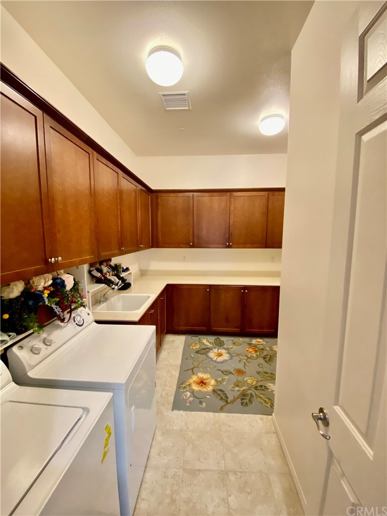 1563 Savannah Creek Beaumont, CA 92223 - Photo 11 of 28 view of a room with a sink and cabinets