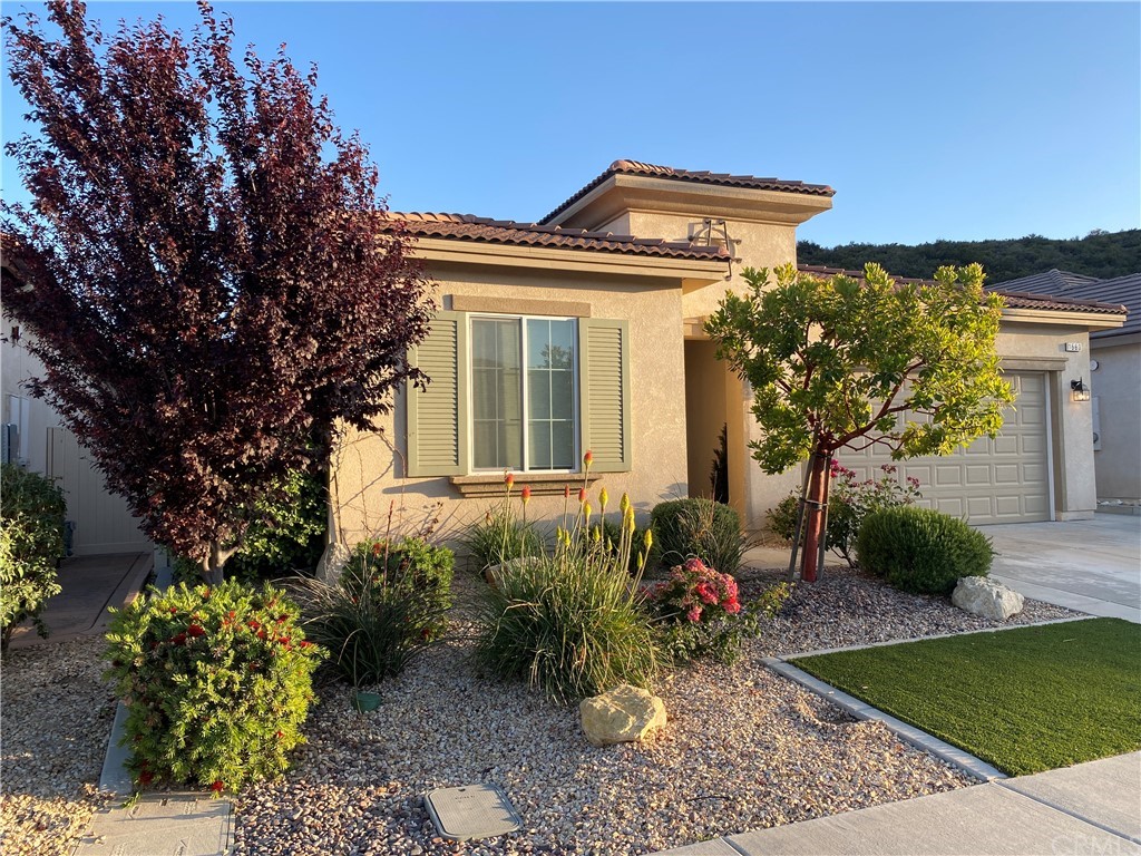 1563 Savannah Creek Beaumont, CA 92223 - Photo 2 of 28 a front view of a house with garden