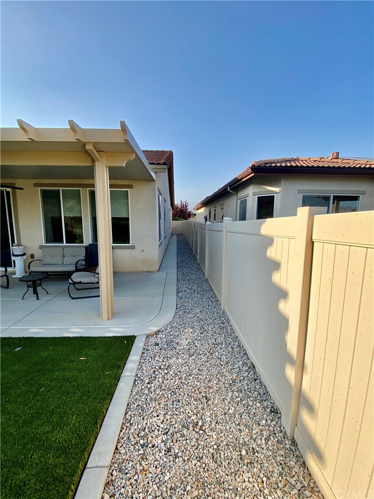 1563 Savannah Creek Beaumont, CA 92223 - Photo 24 of 28 a view of a house with a yard