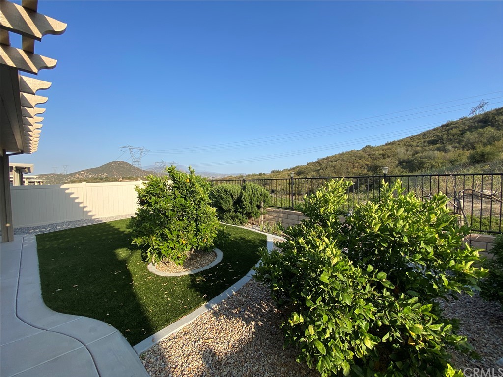 1563 Savannah Creek Beaumont, CA 92223 - Photo 28 of 28 a view of a back yard of the house