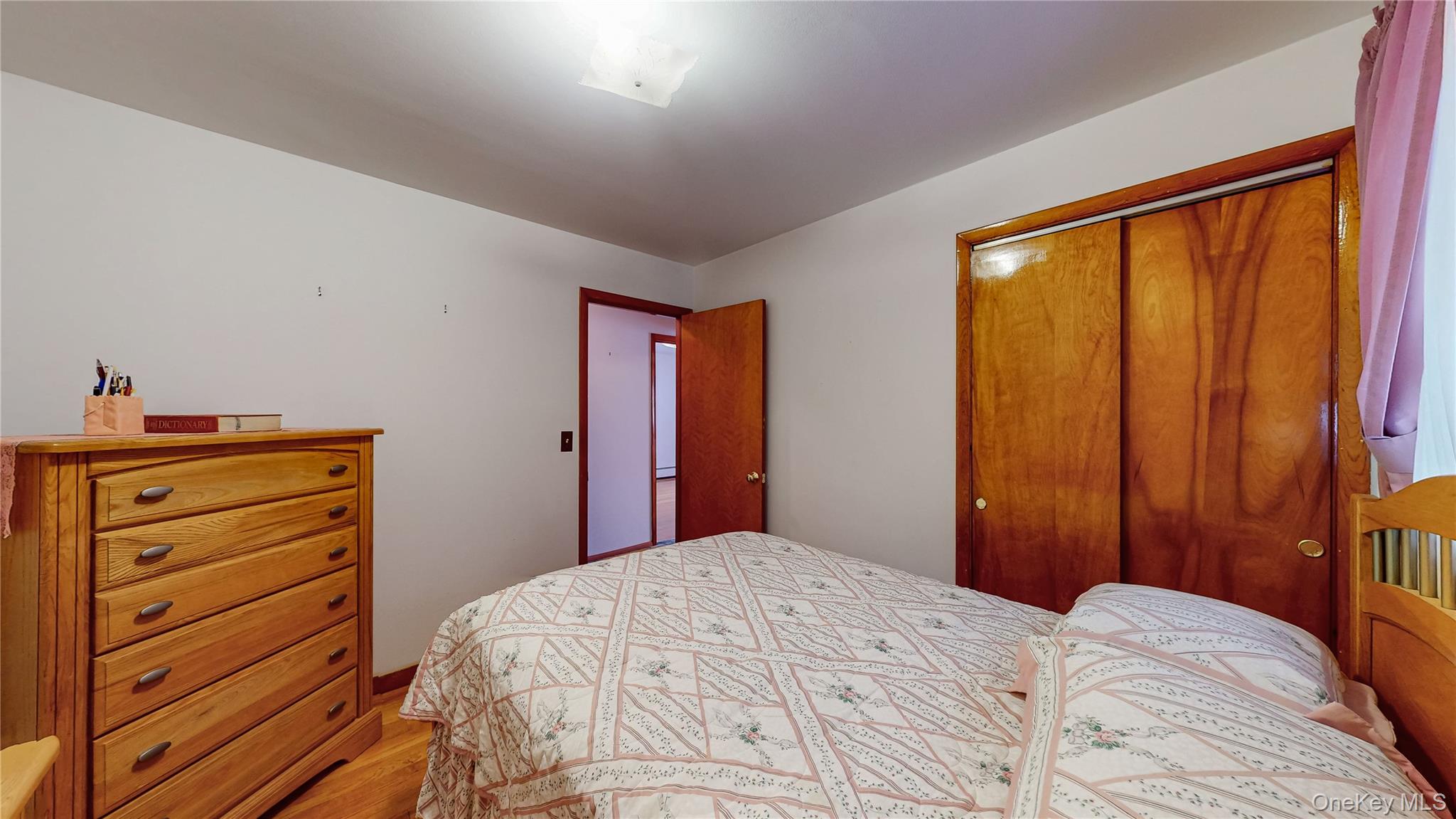 31 Rose Street Florida, NY 10921 - Photo 13 of 31 a bedroom with a bed and cabinets