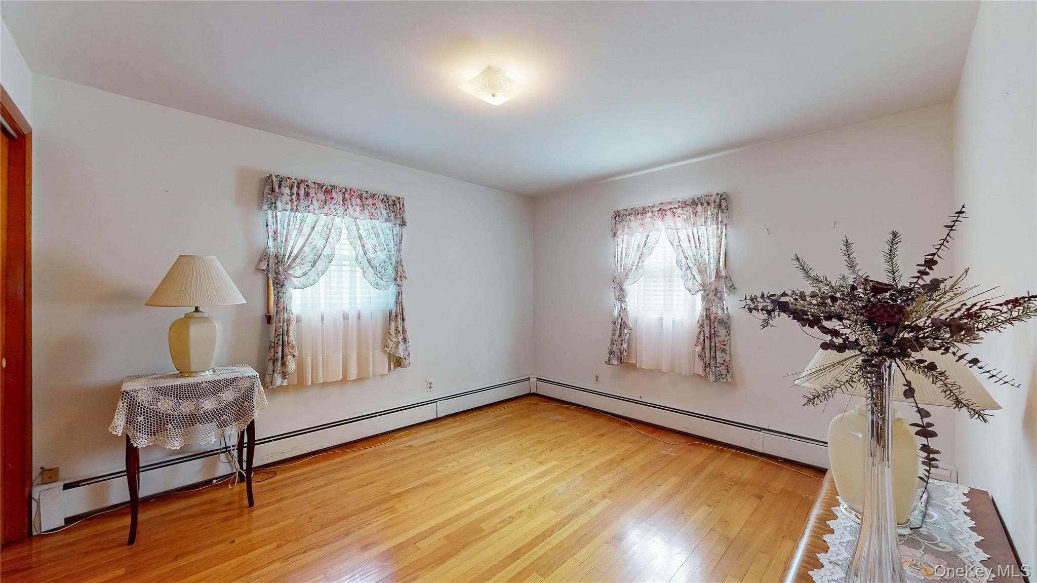 31 Rose Street Florida, NY 10921 - Photo 14 of 31 a view of empty room with window and wooden floor