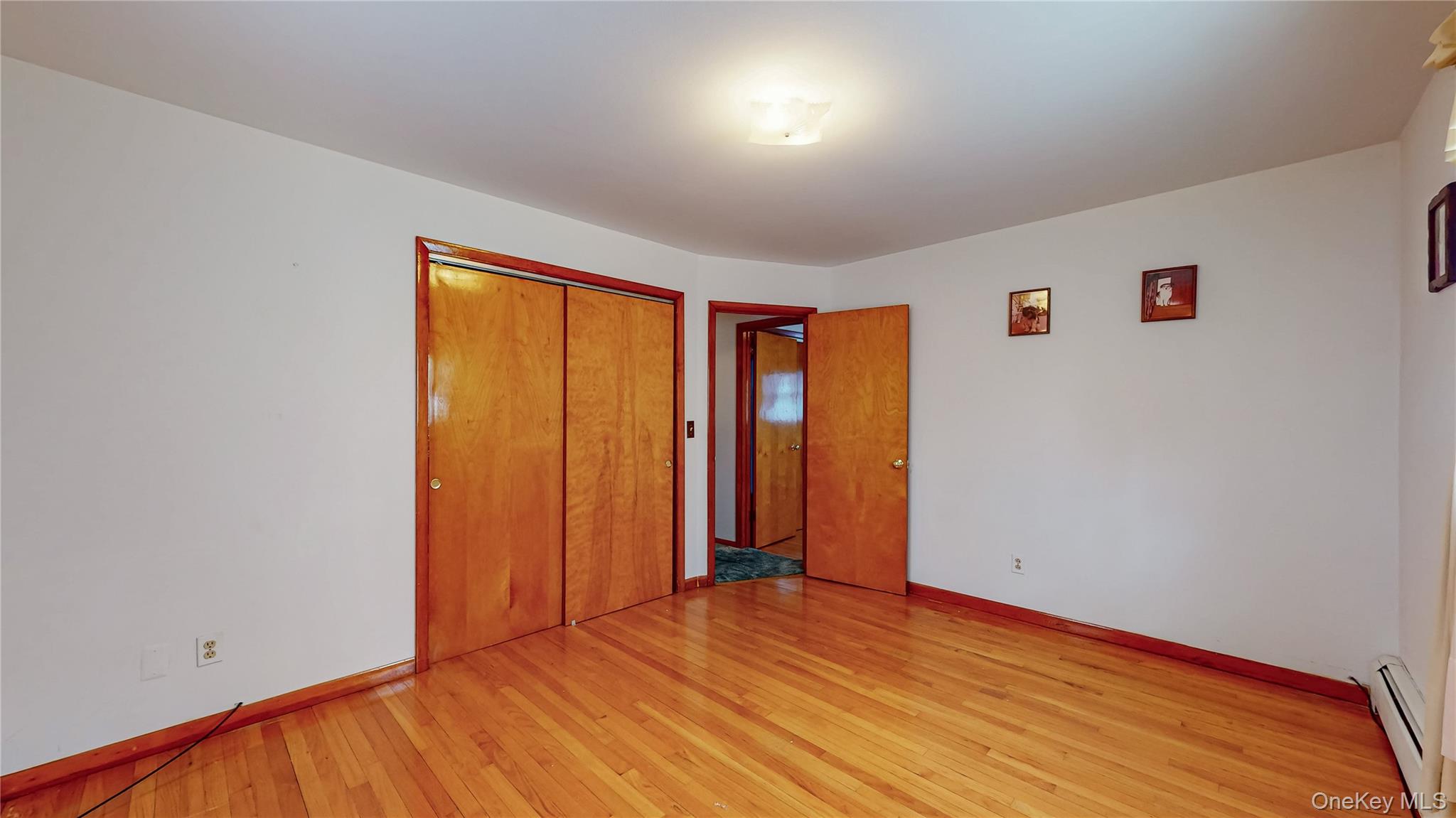 31 Rose Street Florida, NY 10921 - Photo 17 of 31 an empty room with wooden floor and windows