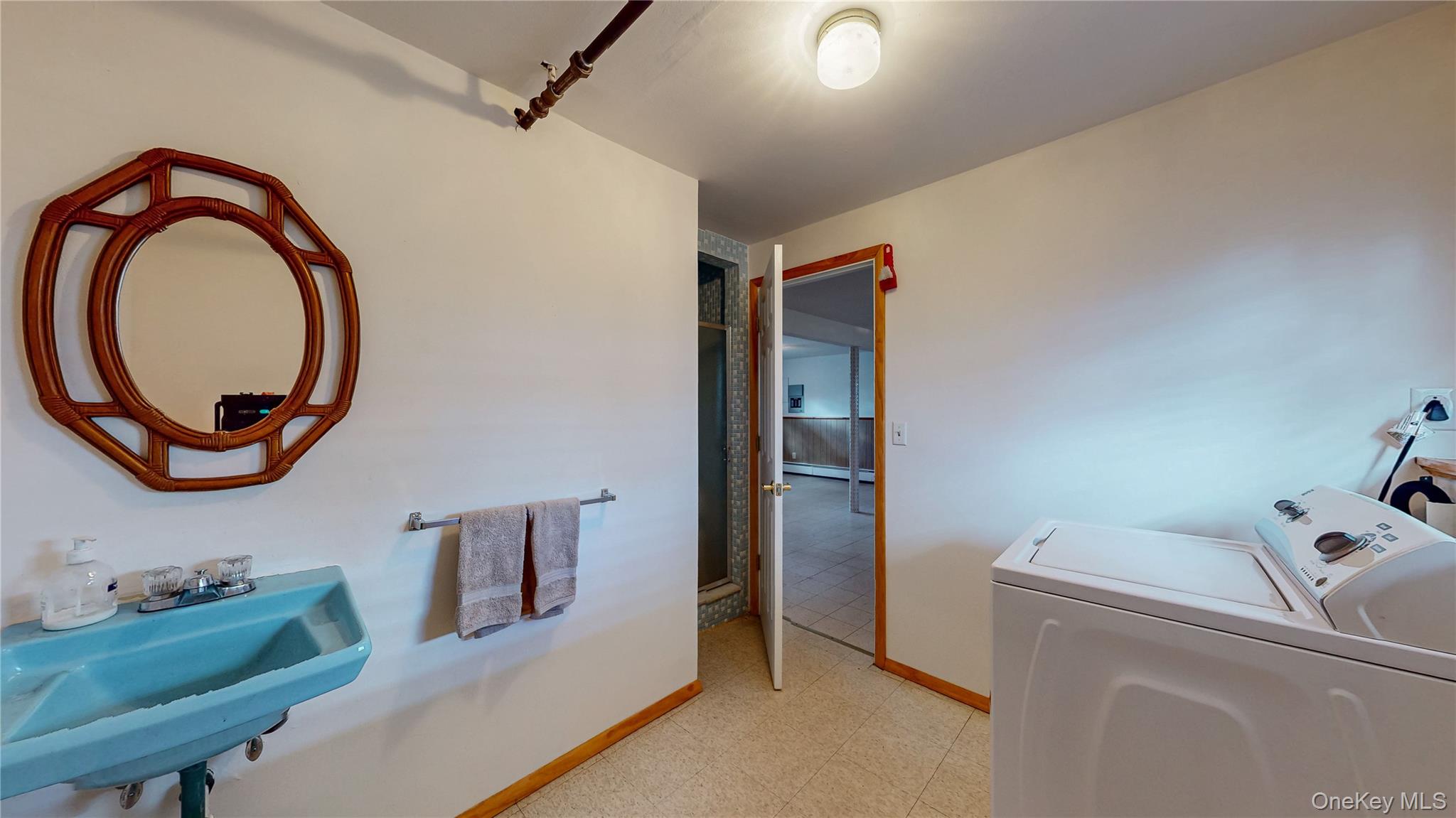 31 Rose Street Florida, NY 10921 - Photo 23 of 31 a bathroom with a sink and a mirror