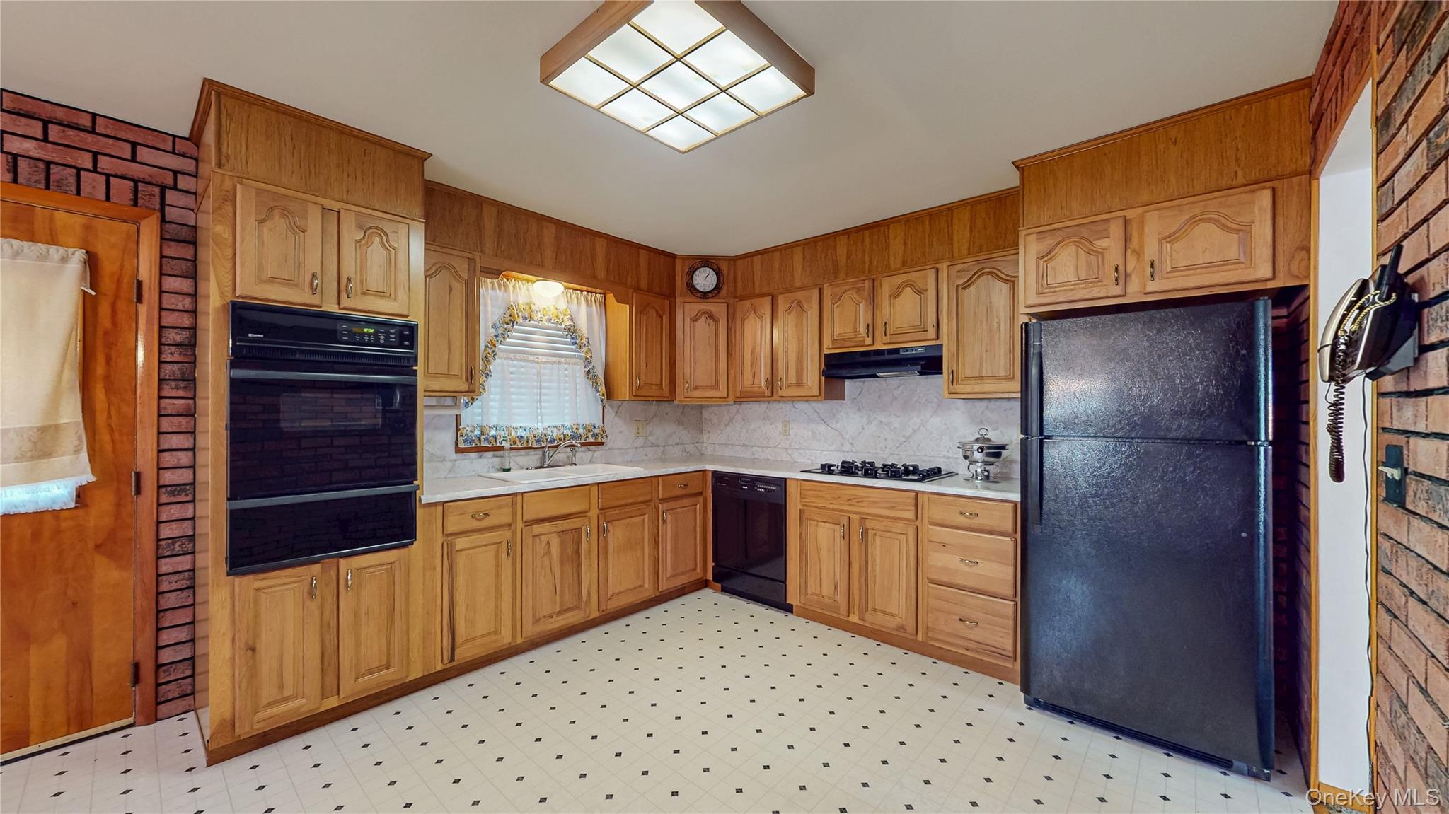 31 Rose Street Florida, NY 10921 - Photo 5 of 31 a kitchen with stainless steel appliances granite countertop a refrigerator and a stove top oven