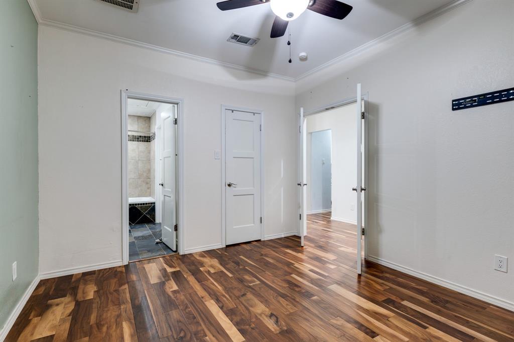 5310 Keller Springs Road, Unit 413 Dallas, TX 75248 - Photo 16 of 20 a view of empty room with wooden floor