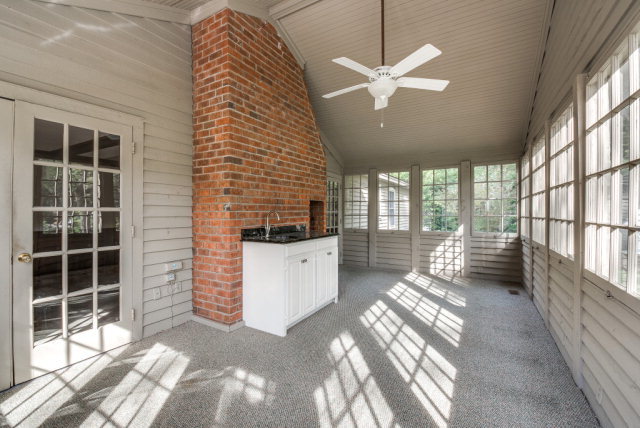 3900 Gloucester Road Rocky Mount, NC 27803 - Photo 26 of 33 You will want to live year round on the beautiful sun porch. There is a wet bar too! This will be a favorite spot for everyone.