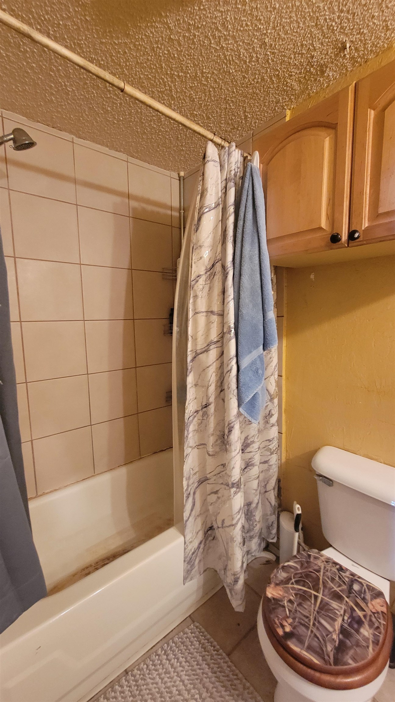 1844 M Road Fruita, CO 81521 - Photo 22 of 32 a bathroom with a toilet and shower