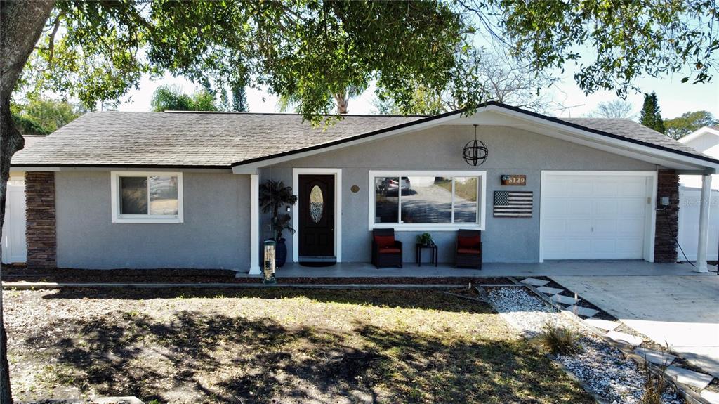 a front view of house with yard