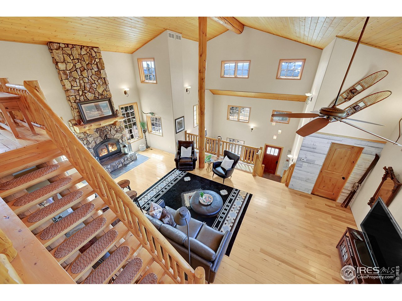 1319 County Road 83 Boulder, CO 80302 - Photo 12 of 30 a living room with furniture and a rug